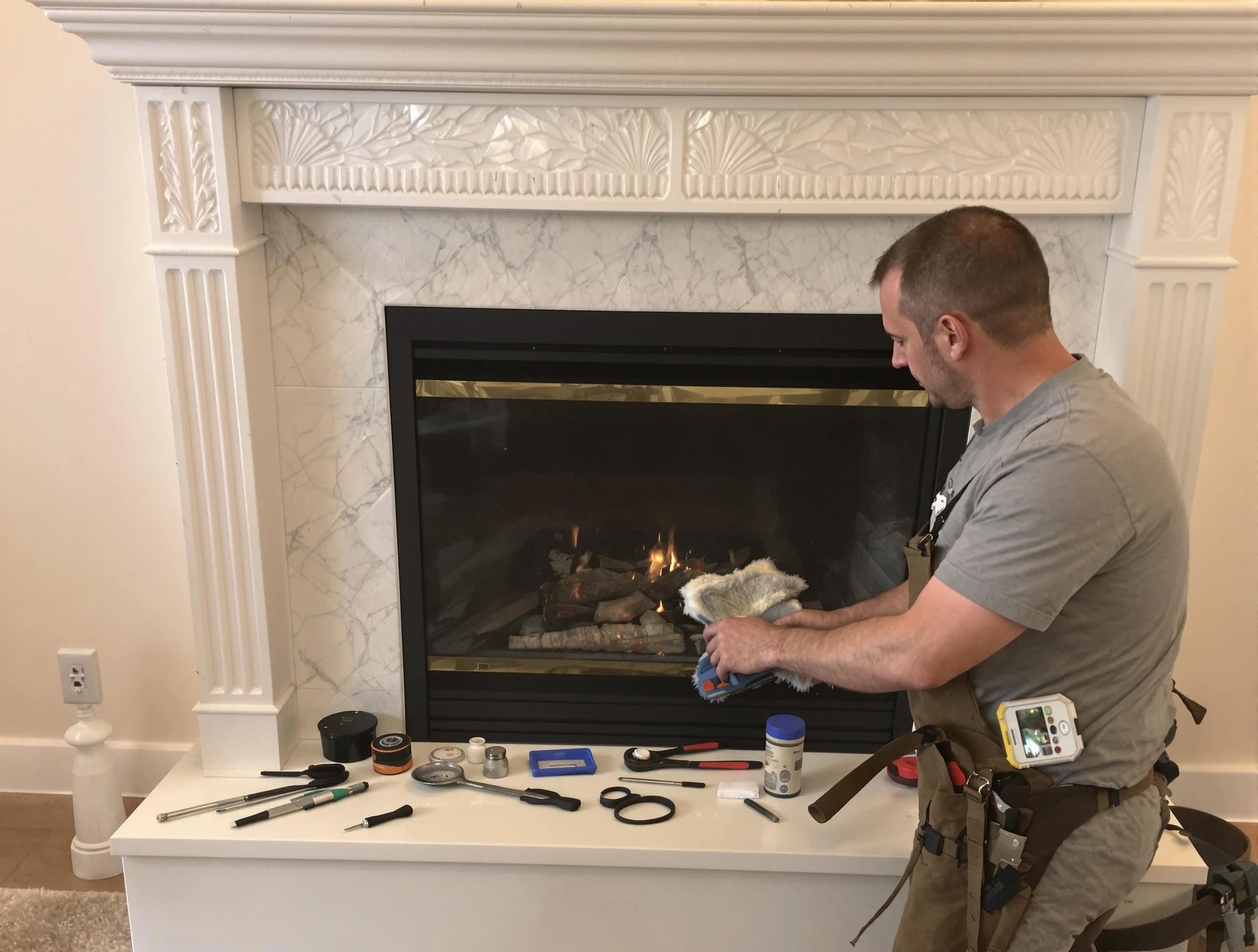 Bellevue Chimney Sweep performing fireplace maintenance in Bellevue, PA